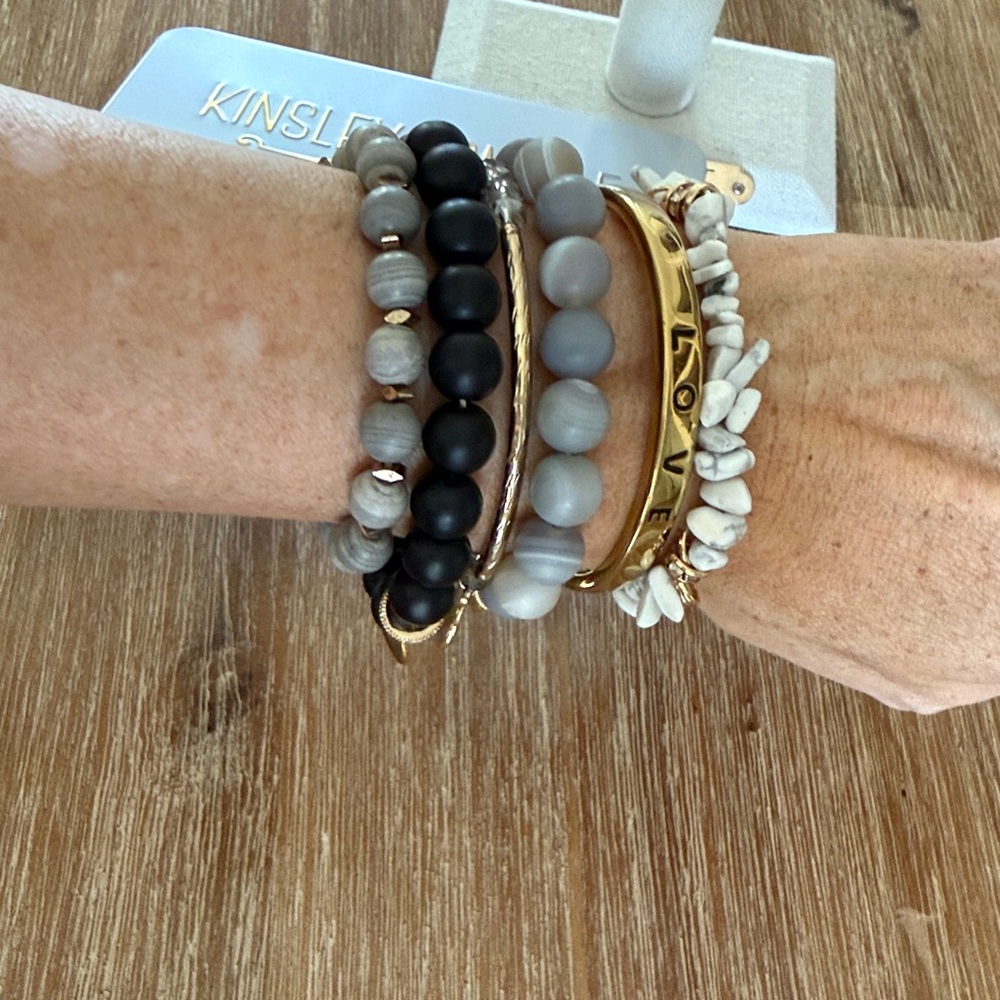 6 Kinsley Armelle stretch bracelets with stand and large metal signature box